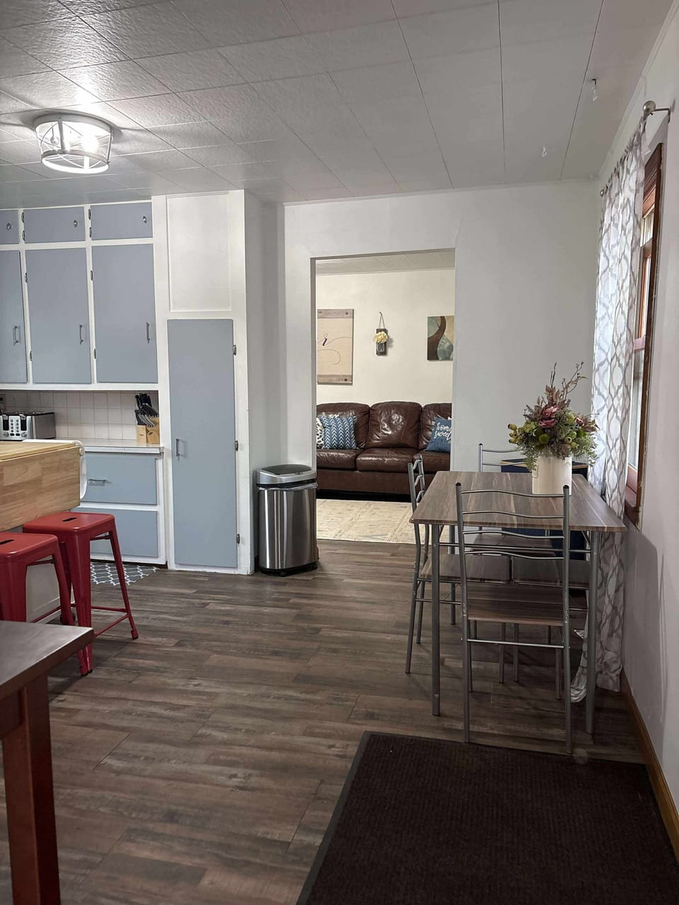 kitchen to living room view and 4 person table 