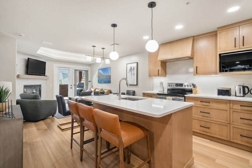 Another view of the open-concept kitchen and living area.