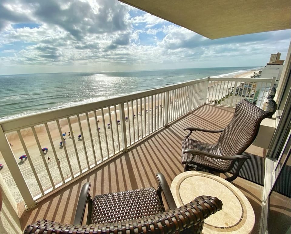 Enjoy a private balcony with stunning views of the beach.