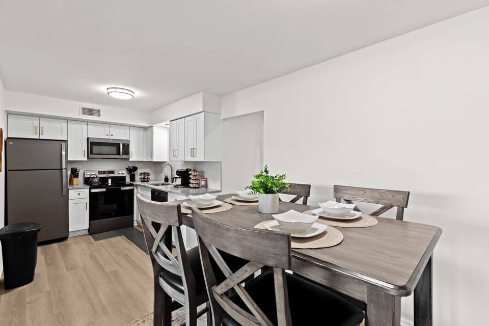 Enjoy home-cooked meals or takeout in this elegant dining area with seating for four.