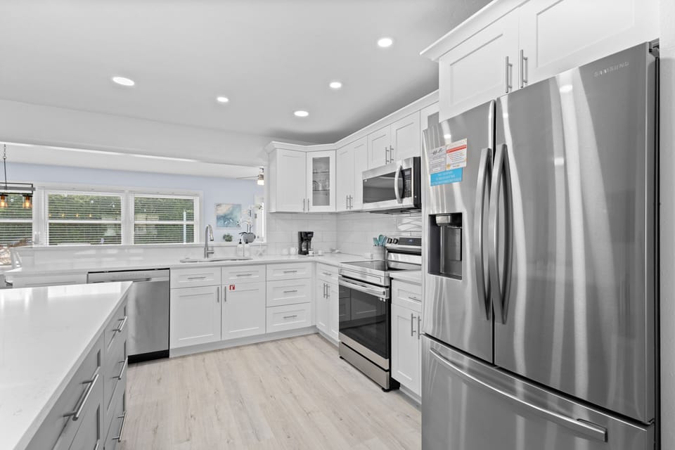 Modern kitchen featuring stainless steel appliances for a stylish and functional cooking experience.
