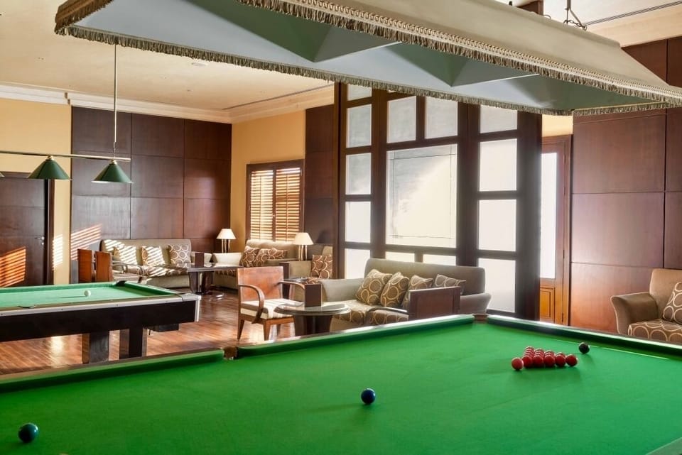Line up the perfect shot and unwind in plush seating.
