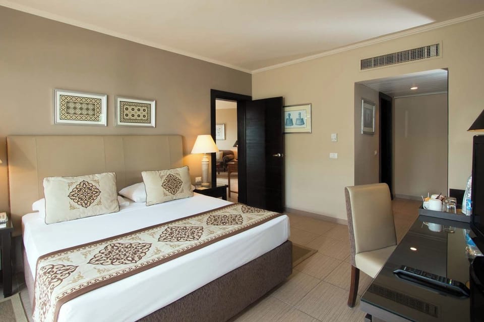 Return to a serene bedroom retreat with thoughtful comforts.