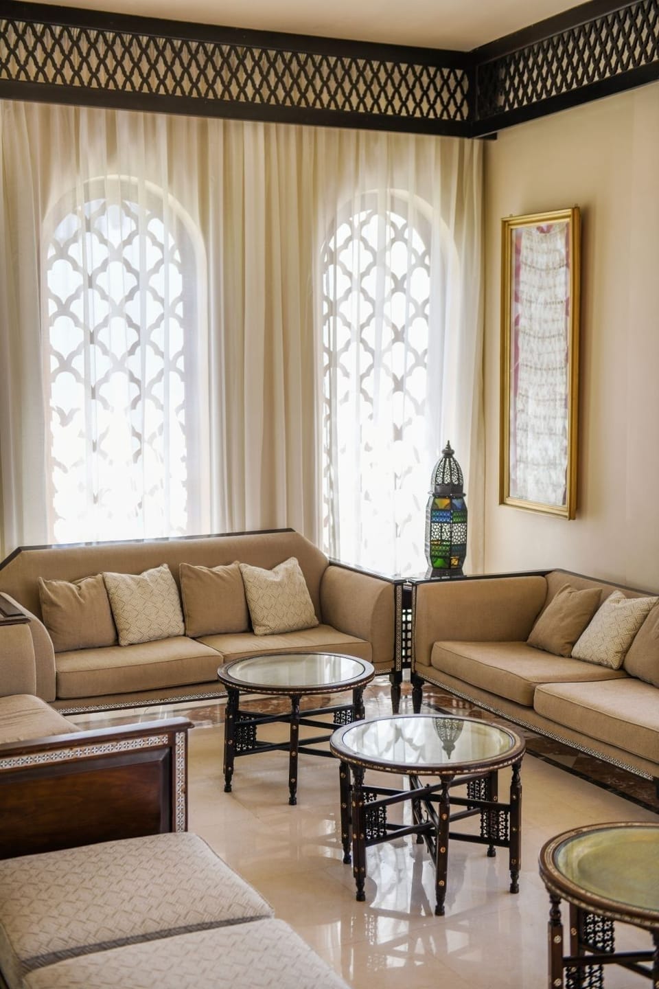 Settle into plush seating beneath soft, filtered natural light.