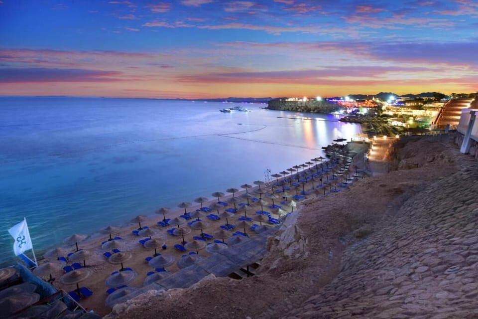 End your day with glowing coastline views at dusk.