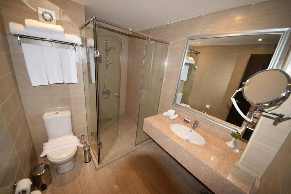 Start your day with a sleek shower and fluffy towels.