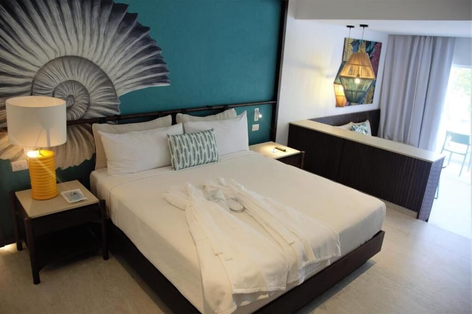 Slip into plush robes and sink into a cloud-soft bed.