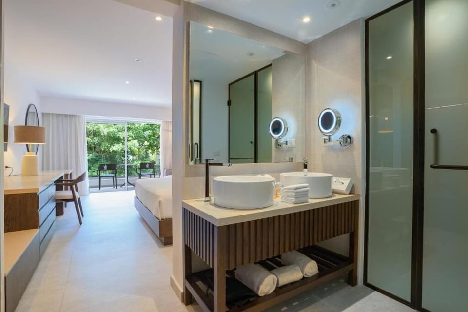 Refresh in a spa-like vanity area steps from your bed