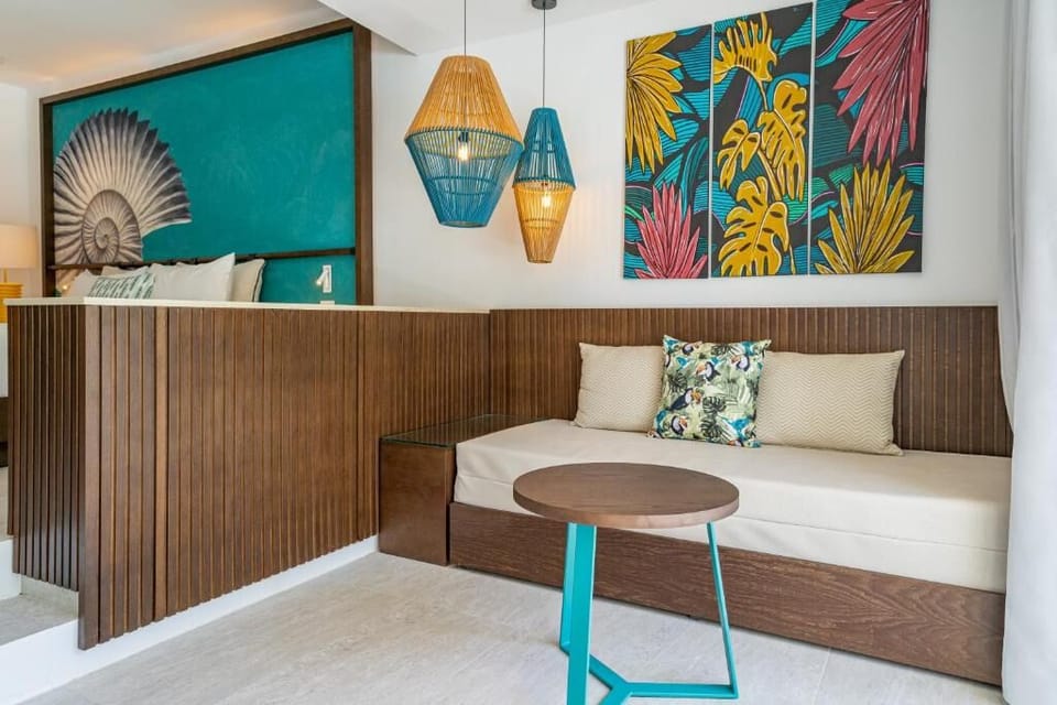Sip coffee in your private nook under warm woven pendants.