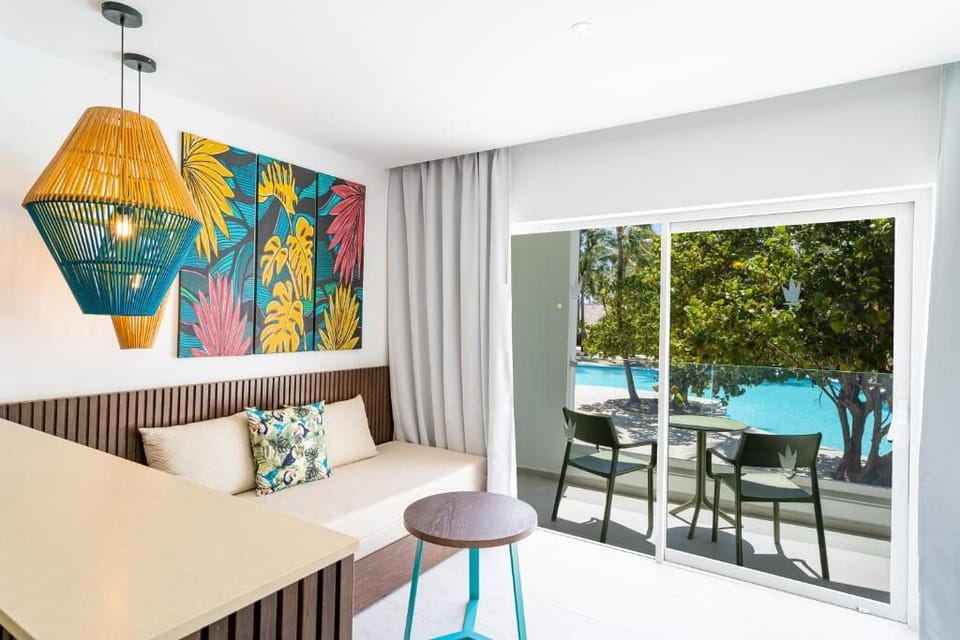 Step onto the balcony and savor sparkling poolside views.