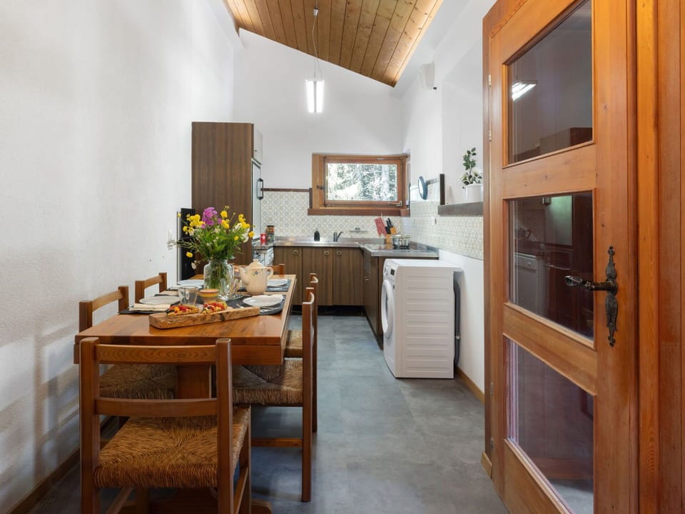 Furniture, Interior Design, Flooring, Wood, Floor, Ceiling, Countertop, Room, Kitchen, Chair