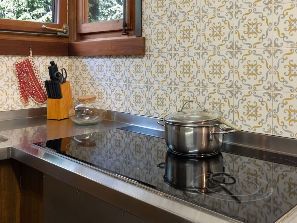 Kitchen, Flooring, Countertop, Kitchen Sink, Plumbing Fixture, Tap, Plumbing, Sink, Tile, Kitchen Stove