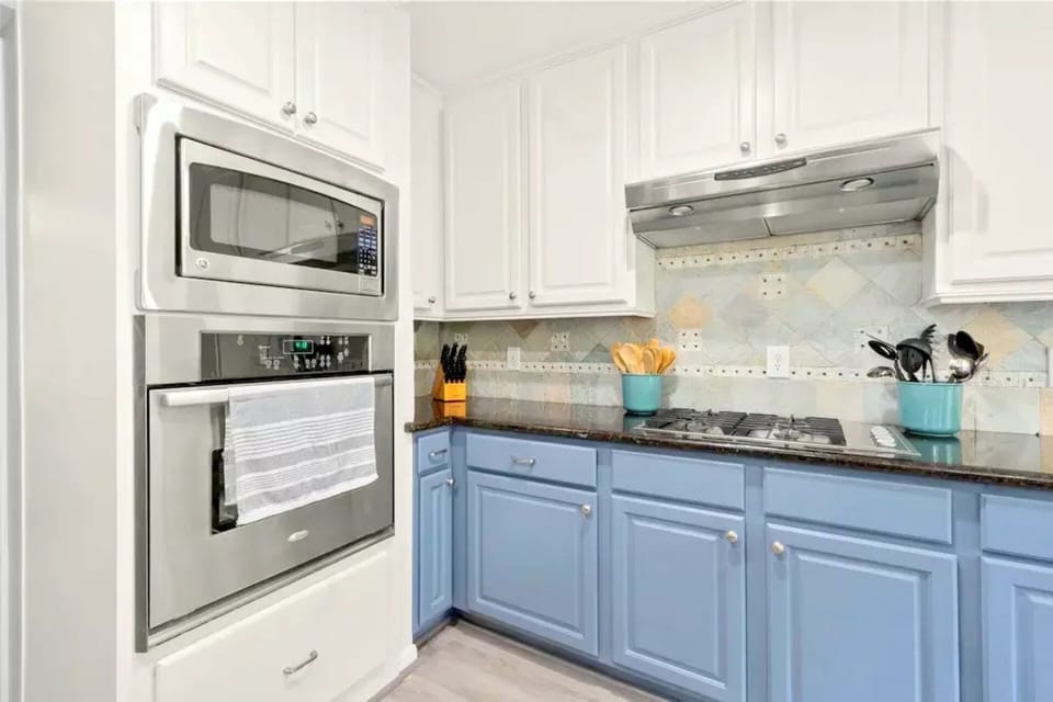 Cook with ease in this well-equipped and inviting kitchen space.
