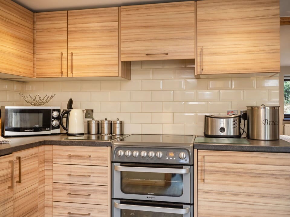 Cabinetry, Flooring, Wood, Kitchen, Interior Design, Furniture, Countertop, Drawer, Floor, Kitchen Appliance