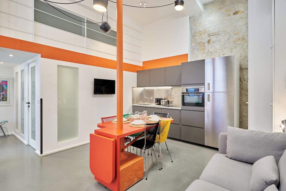 living room with kitchen and dining table