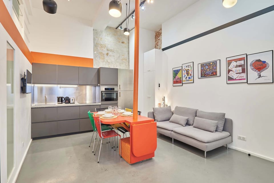 living room with kitchen and dining table
