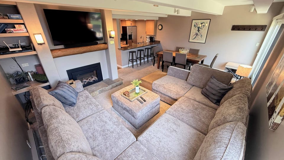 Living Area with 55" TV and Gas Fireplace