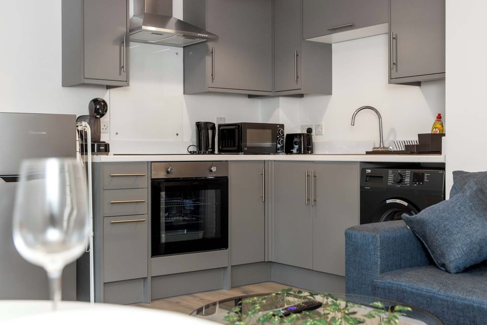 Well equipped Kitchen with washing machine, oven, hob, microwave, fridge, kettle, toaster, coffee maker and utensils