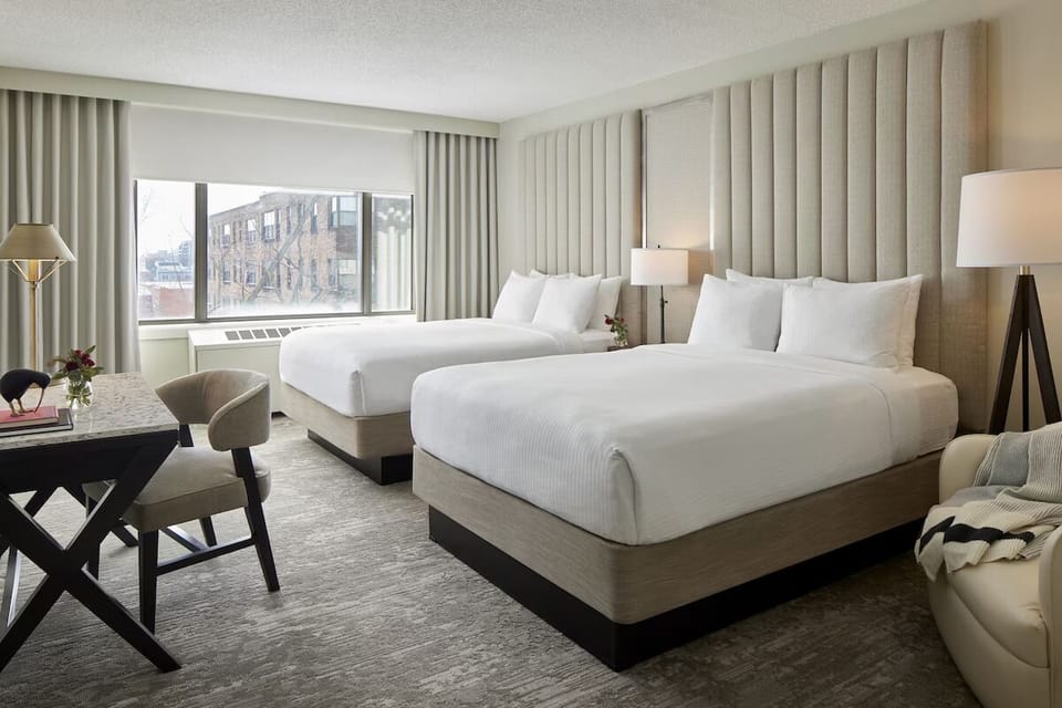 Settle into two cloud-soft beds for effortless rest.