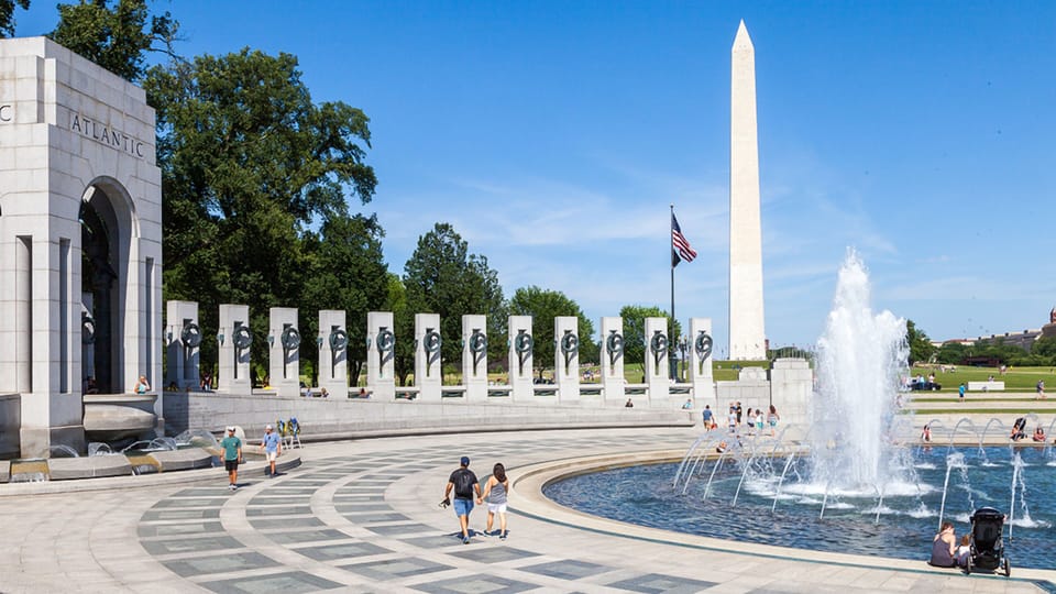 Unwind by reflective fountains after a day of exploring.