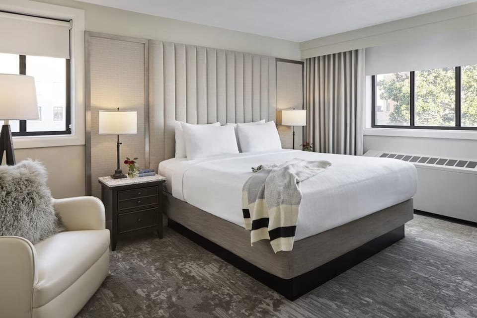 Unwind in crisp linens and drift off in quiet comfort.