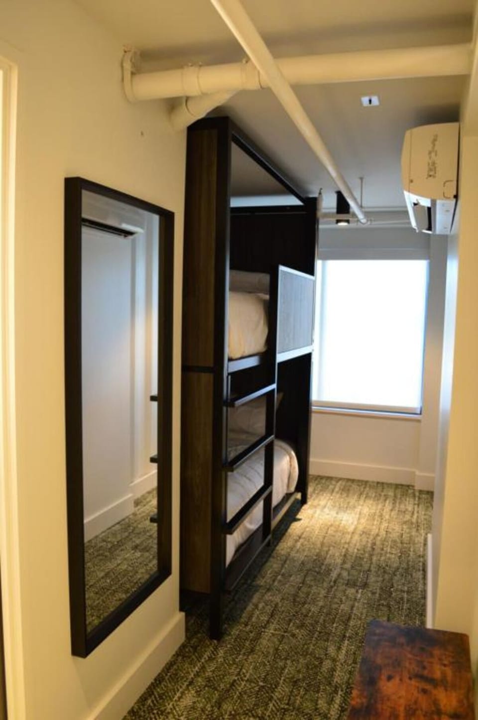 Maximize your stay with cozy bunks and smart hallway space.