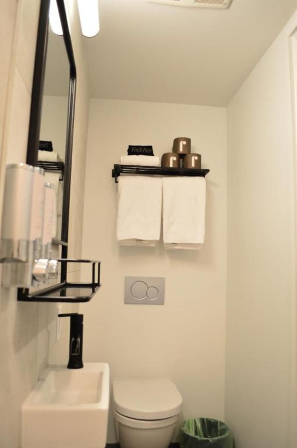 Freshen up effortlessly with bright vanity and spa amenities.