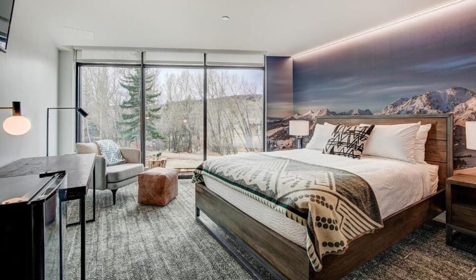 Stretch out in style with panoramic views and plush bedding.