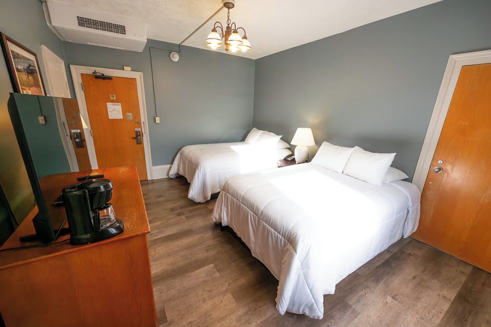 Settle in with TV, coffee station, and easy room access.