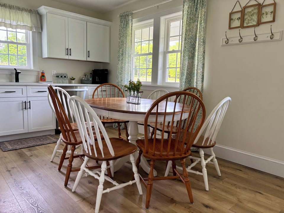 Dining area with a view of the front lawn. High chair(s) available upon request.