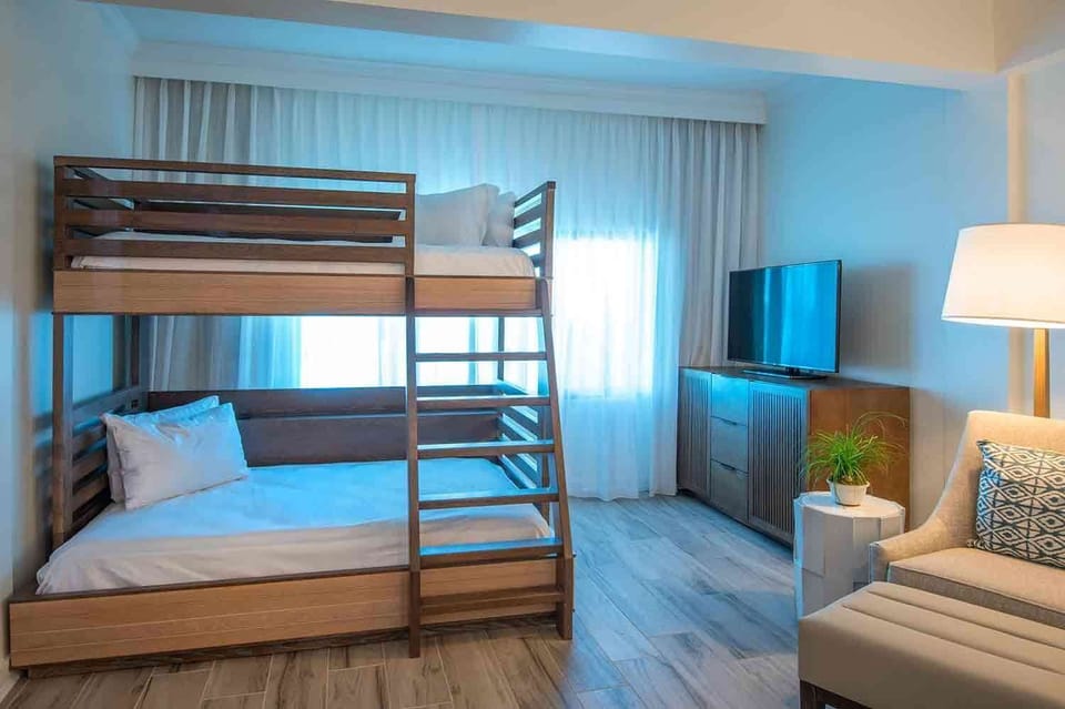 Let little travelers rest and play in a cheerful corner designed for comfort, laughter, and laid-back island days.