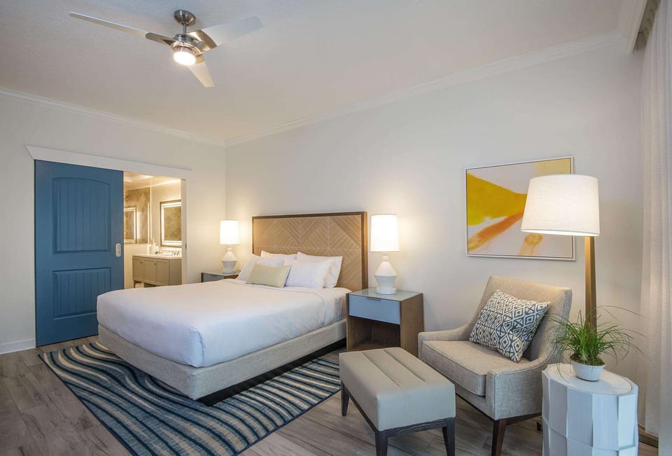 Unwind in a cozy retreat where vibrant accents and soft tones create the perfect balance of calm and color.