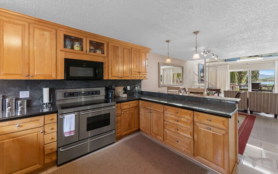 The spacious and well-equipped kitchen, with granite counter tops and all the amenities!