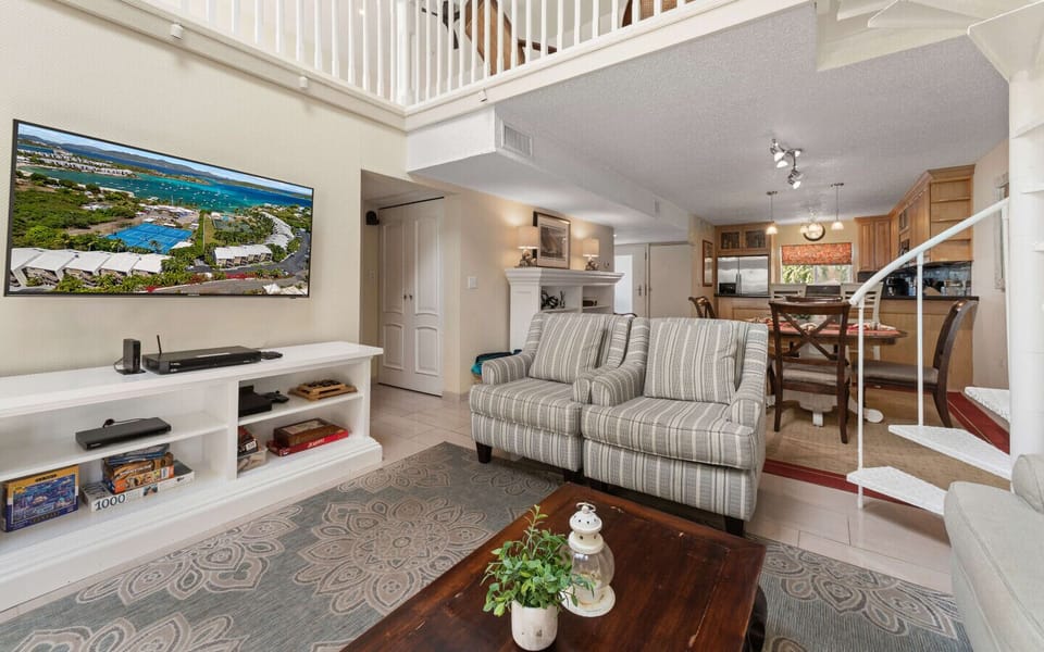 The comfy living room area with cold AC and a flat screen TV