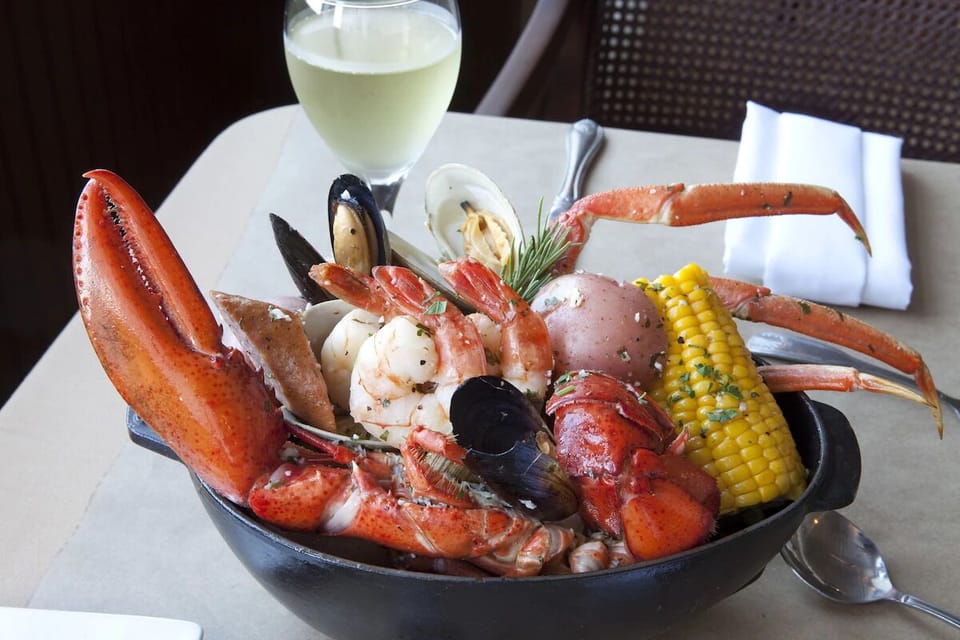 Indulge in fresh seafood flavors paired with a crisp drink.