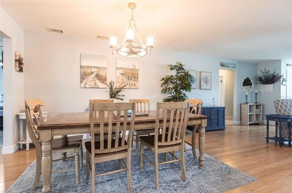 Dining table with 6 chairs, but more chairs are available to seat 8