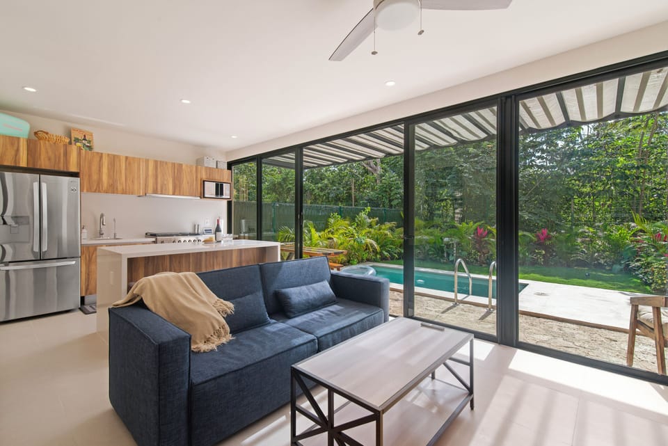 open concept floor plan with floor to ceiling sliding doors