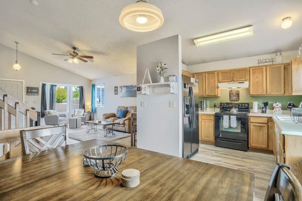 Bright open-concept kitchen and living space, fully equipped with everything you need to cook and gather comfortably. Enjoy the ease of connected spaces perfect for group meals and relaxed downtime.