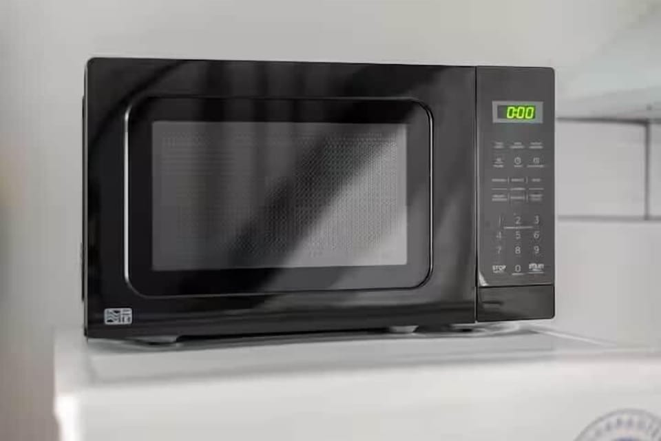 microwave and dining and essentials, convenient for longer stays.