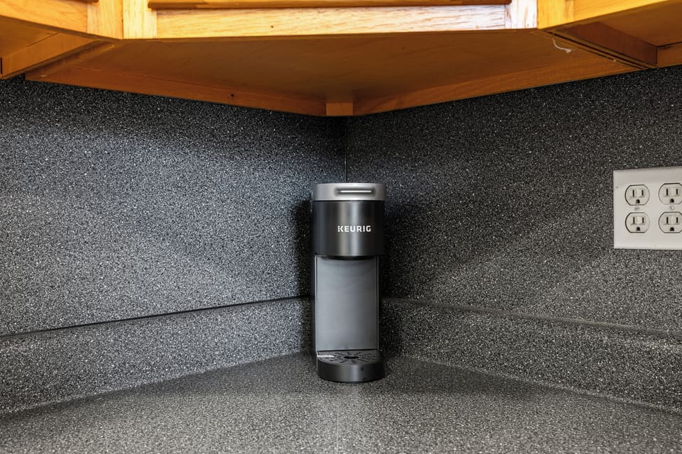 Enjoy your morning coffee with a convenient one-cup Keurig, perfect for a quick brew.