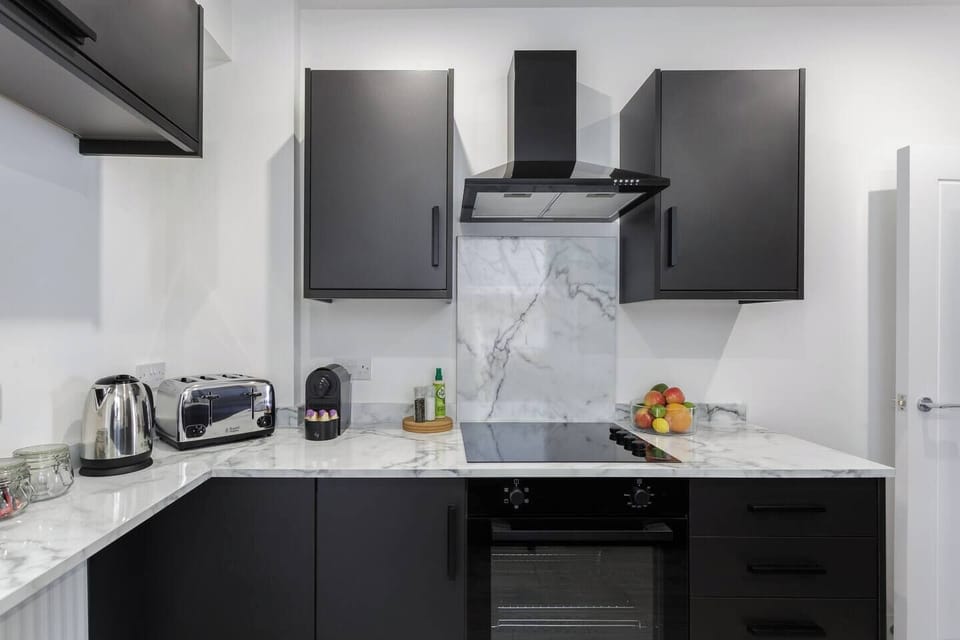Modern, fully equipped kitchen with everything you need – including coffee fix essentials.