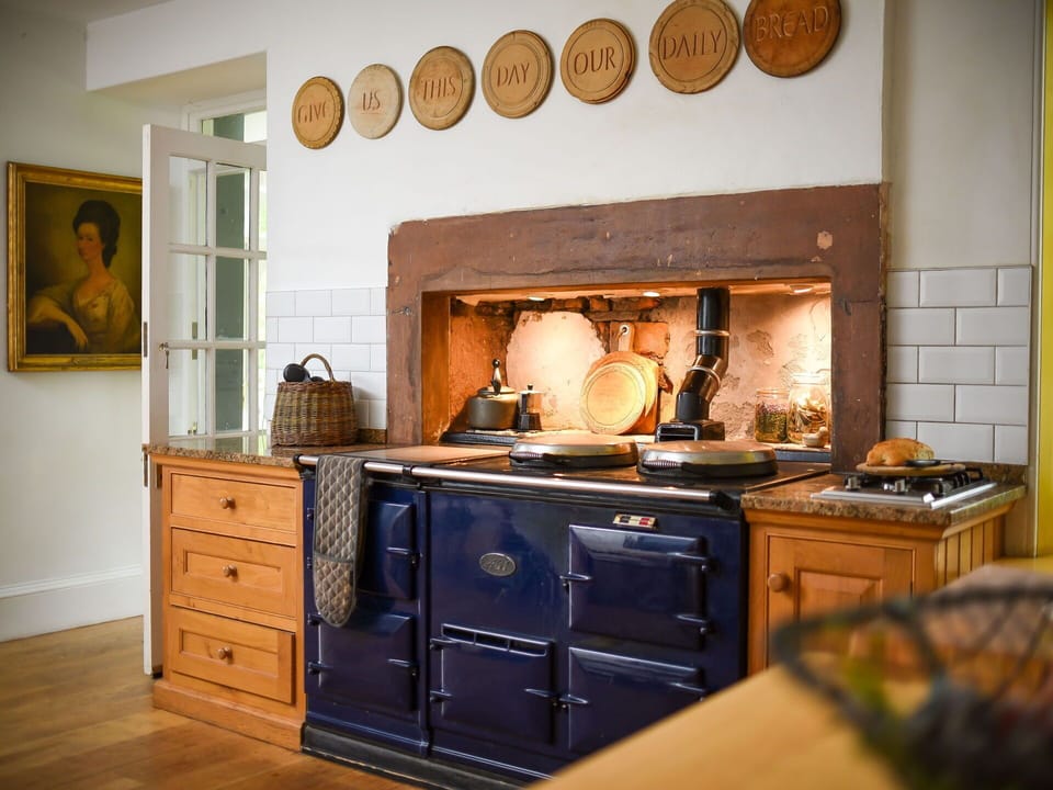 Kitchen, Stove, Kitchen Stove, Kitchen Appliance, Cabinetry, Brick, Gas Stove, Drawer, Major Appliance, Wood Stain