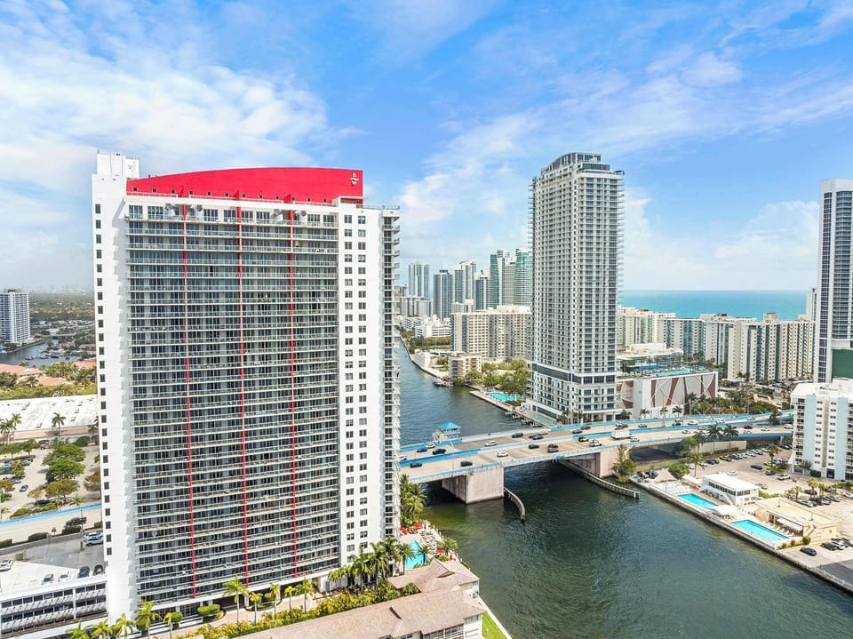 Over View Of The Building, Water And Surrounding Buildings