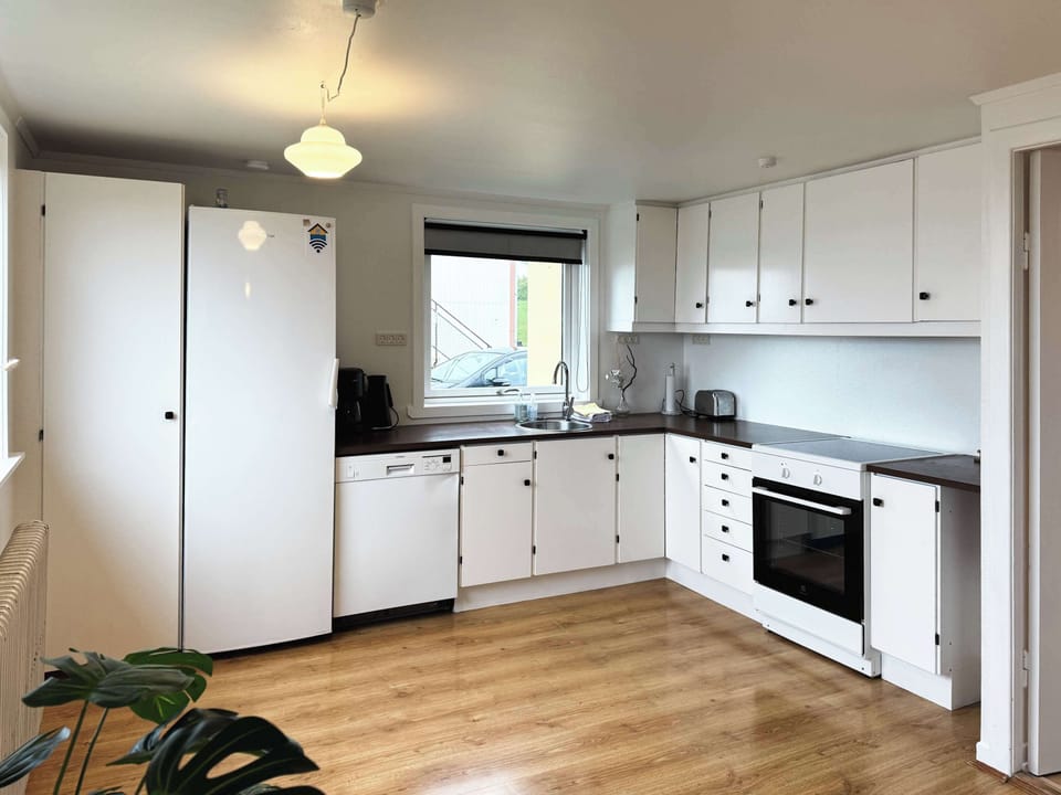 The kitchen is fully equipped and open, offering everything you need to prepare meals during your stay.