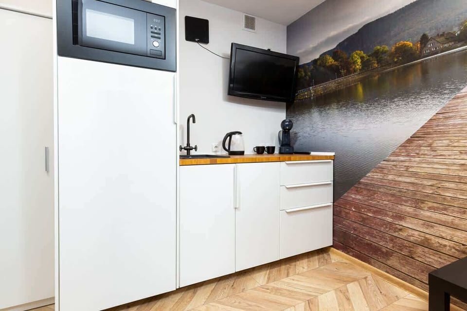 The kitchenette from another angle, with clean lines and a practical design.
