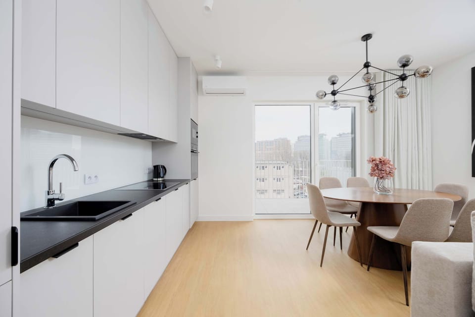 A sleek, modern kitchen with practical equipment.