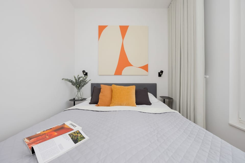A bedroom with a comfortable bed.
