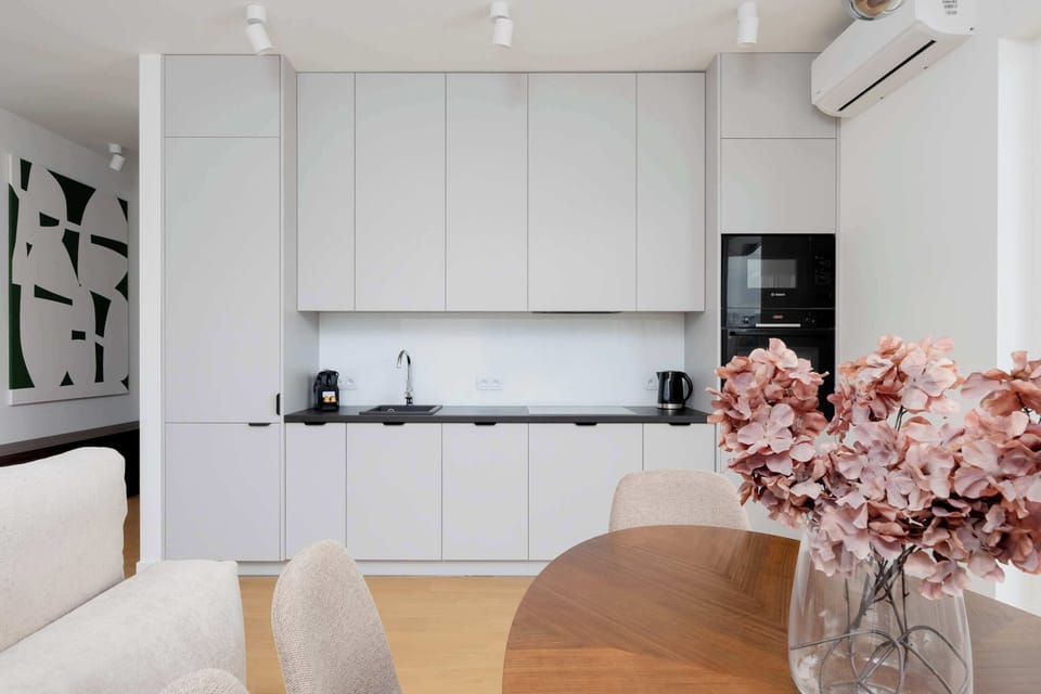 A sleek, modern kitchen with functional equipment.
