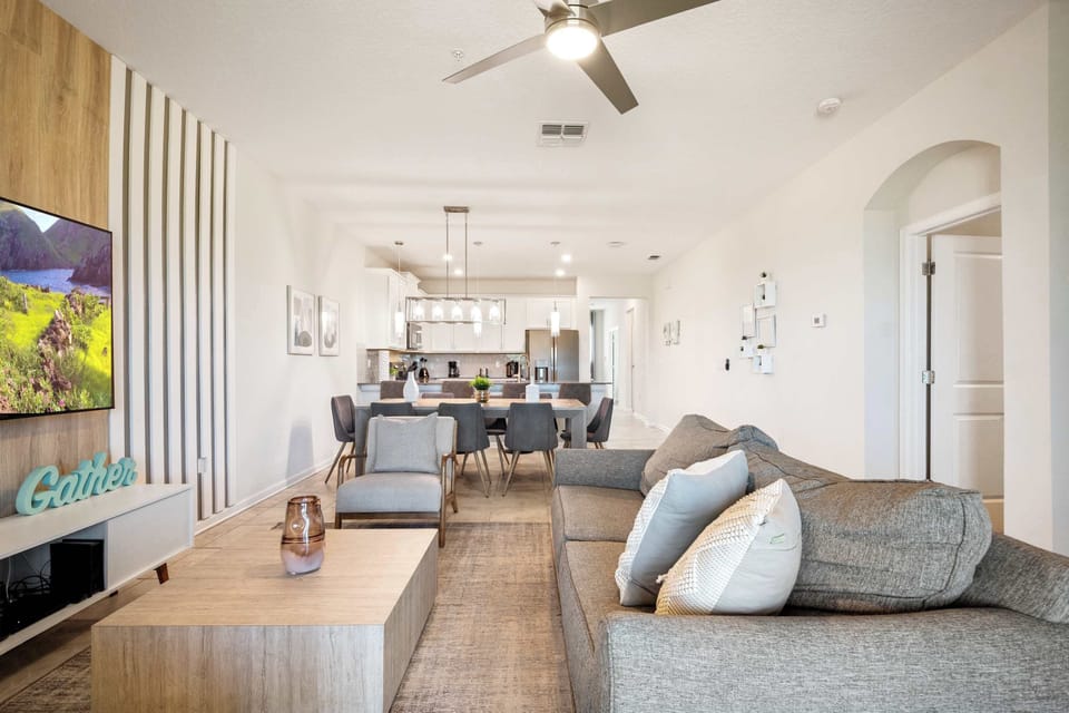 Stylish lounge flows to the modern dining and kitchen. Bright open-plan.