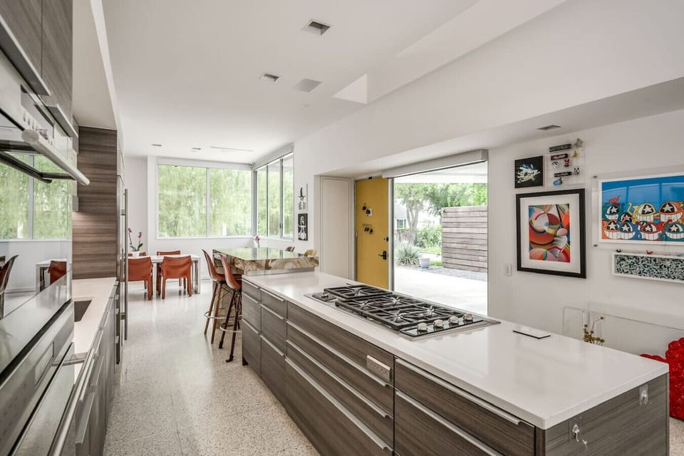 The custom chef’s kitchen is the heart of the home, custom marble, Wolf gas burners, wolf steam oven, Wolf double convection oven, Subzero refrigerator, usb ports under bar. Poggenpohl cabinetry are fully stocked for all your cooking needs